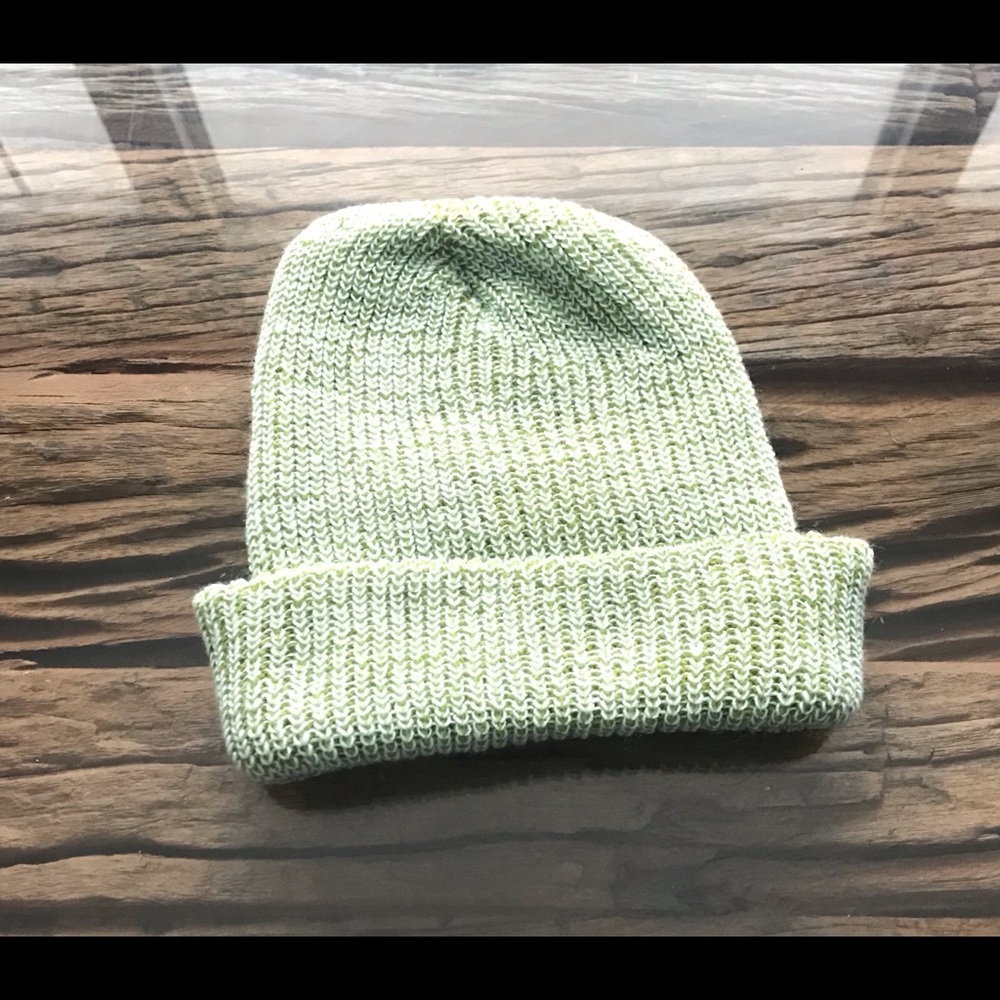 Winter hat. Light sage green color. Knitted hat.